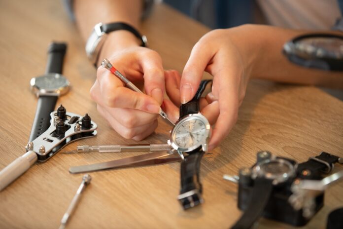 Female,Specialist,Repairing,A,Wrist,Watch